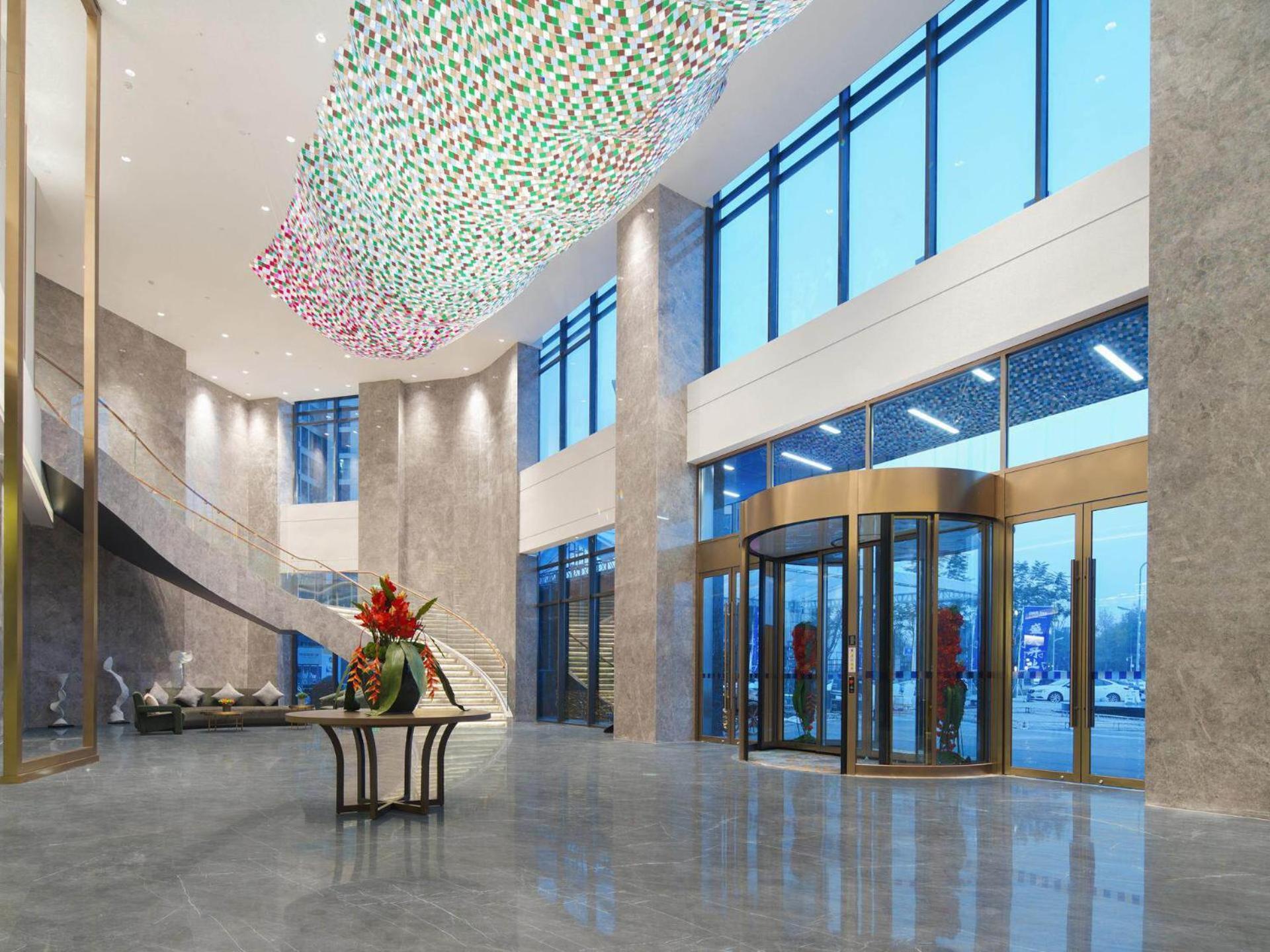 Park Inn By Radisson Nanchong Yilong Star City Plaza Dış mekan fotoğraf