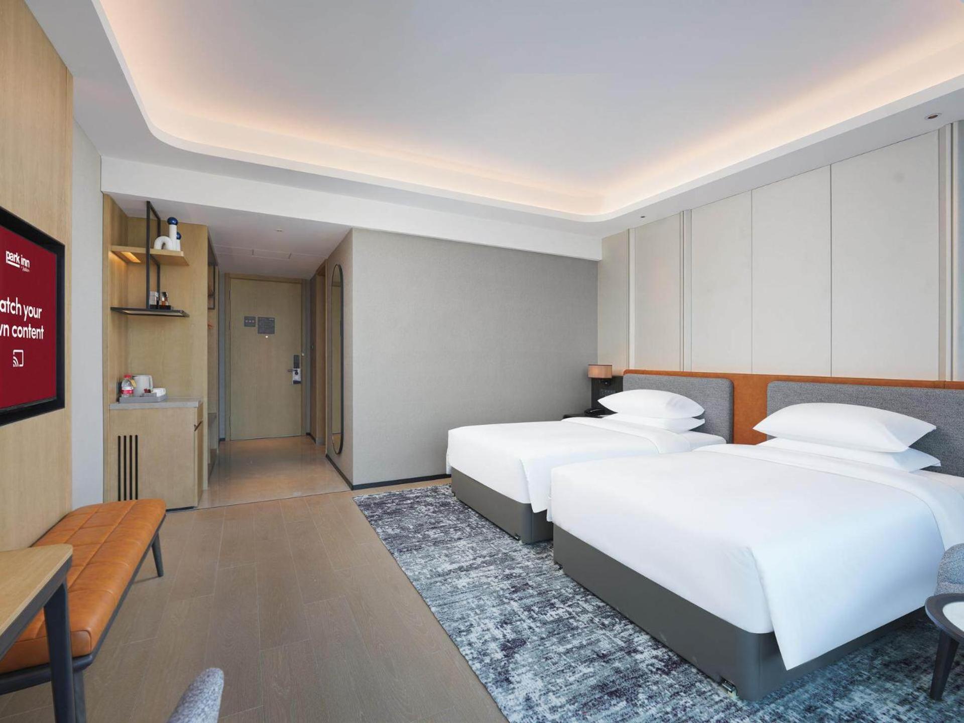 Park Inn By Radisson Nanchong Yilong Star City Plaza Dış mekan fotoğraf