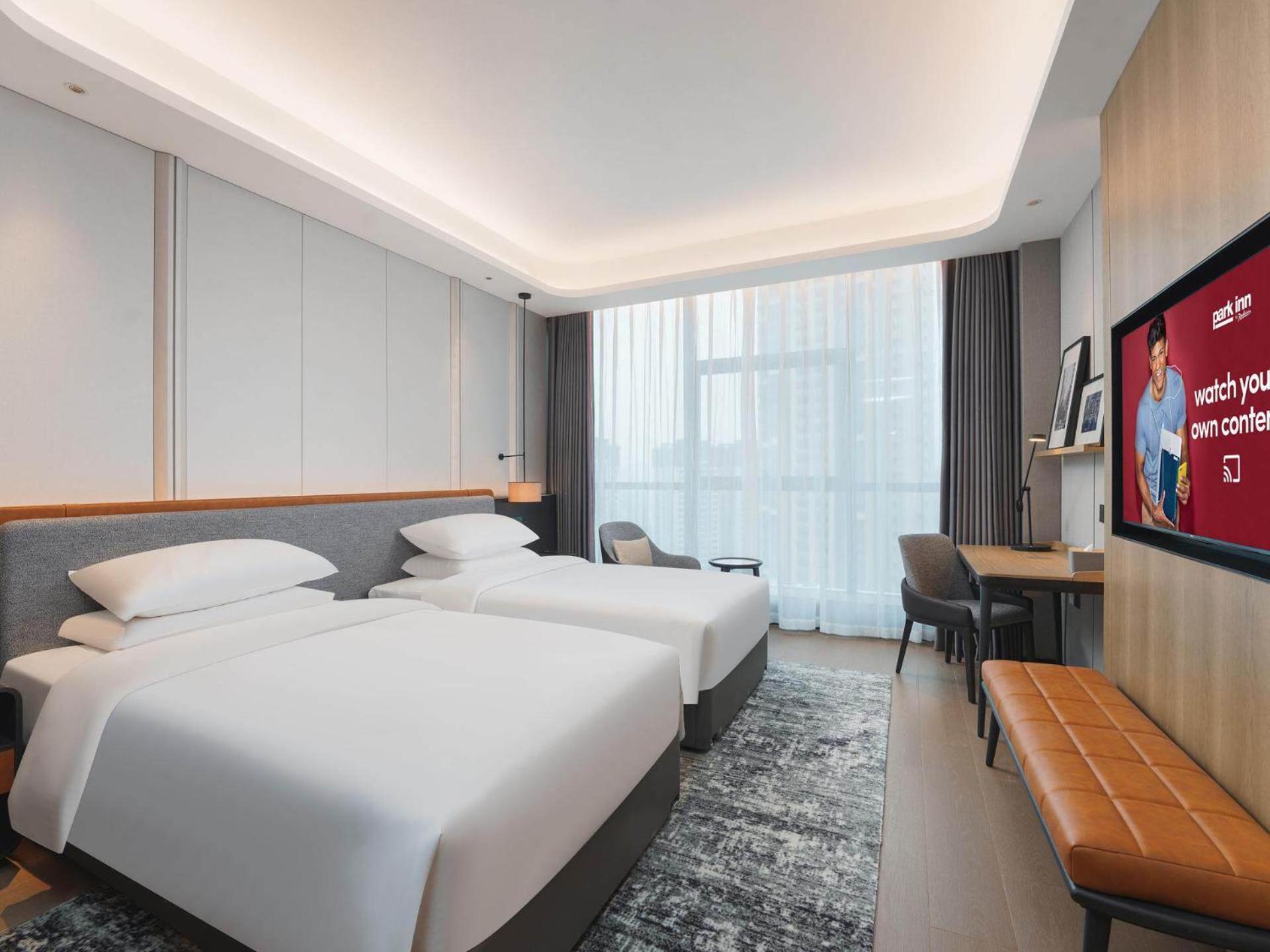 Park Inn By Radisson Nanchong Yilong Star City Plaza Dış mekan fotoğraf