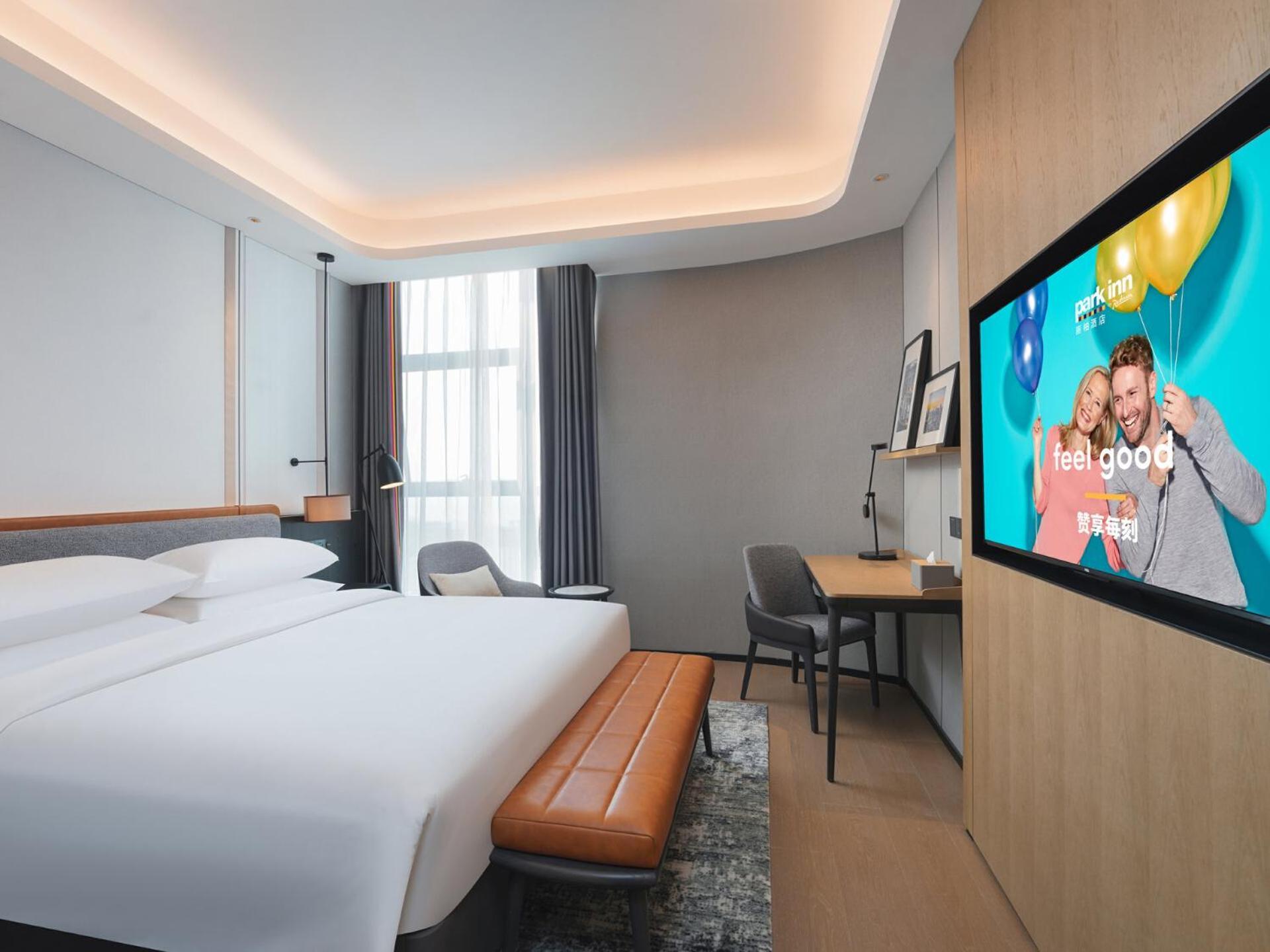 Park Inn By Radisson Nanchong Yilong Star City Plaza Dış mekan fotoğraf