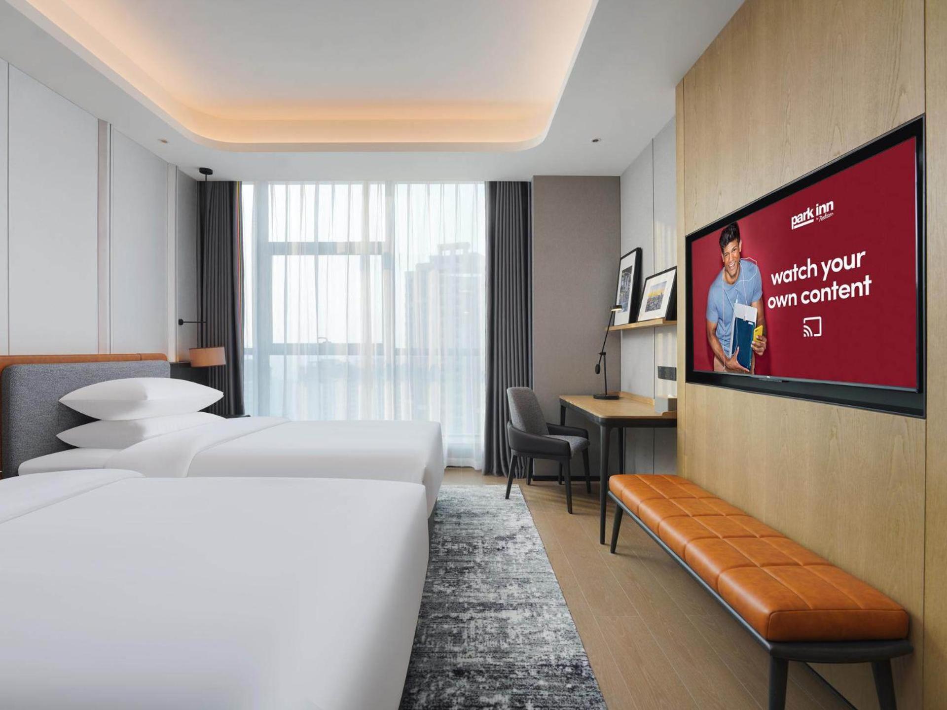 Park Inn By Radisson Nanchong Yilong Star City Plaza Dış mekan fotoğraf