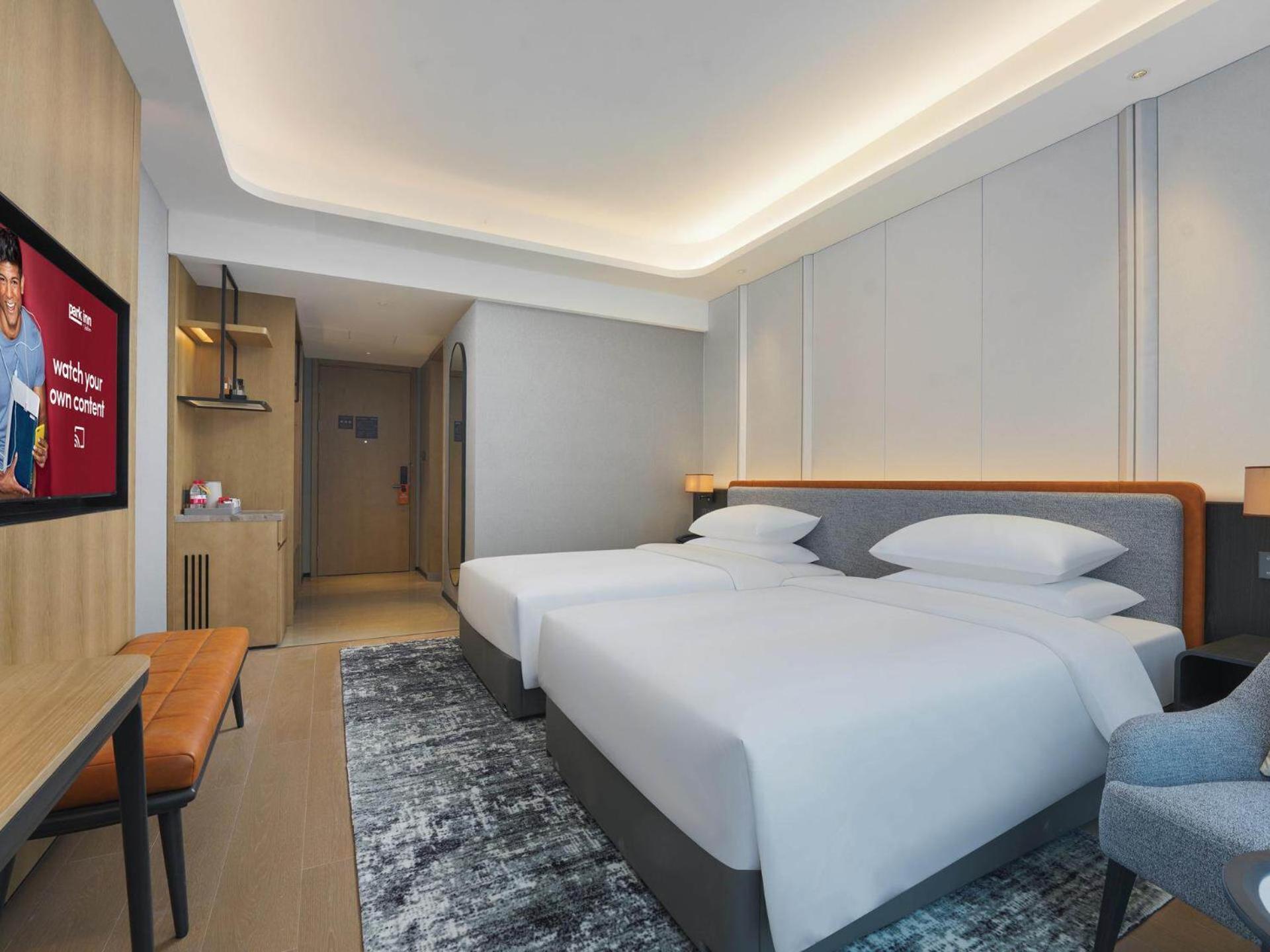 Park Inn By Radisson Nanchong Yilong Star City Plaza Dış mekan fotoğraf